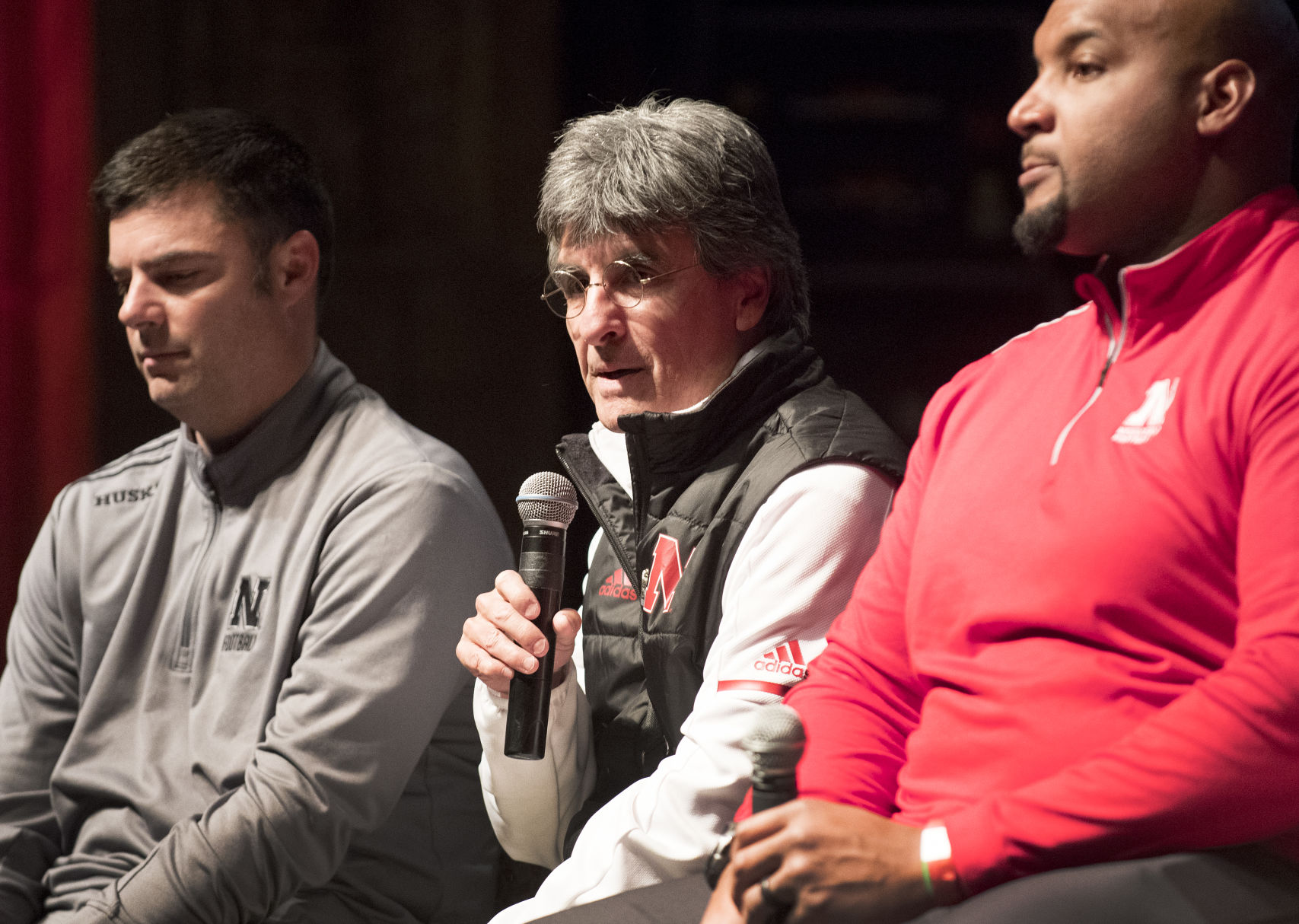 Husker football coaches at the Rococo Theatre